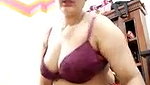 Aunty rubing her pink pussy  showing