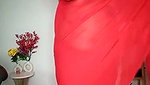 Beautiful bhabhi showing her boobs in transparent red saree