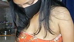 Nisha showing her boobs in kitchen room