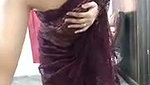 Beautiful sexy girl undress her purple saree  showing