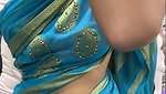 Beautiful girl show her boobs in blue saree