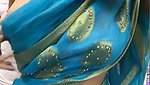 Beautiful girl show her boobs in blue saree