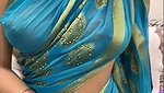 Beautiful girl show her boobs in blue saree