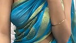 Beautiful girl show her boobs in blue saree