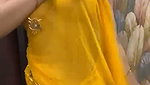Slim beautiful girl in yellow saree  show her boob