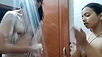Hot couple bathing  showing her figure