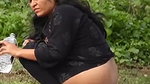 Aunty showing her big ass while pissing outdoor
