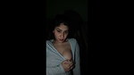 Beautiful girl showing her sexy boobs  pressing