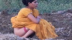 Sexy girl showing her ass while pissing outdoor