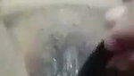 Aunty drilling her pussy with big brinjal