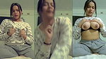 Beautiful girl showing her boobs  pressing