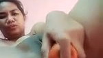 Aunty drilling her pussy with carrot