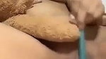 Beautiful cute girl inserting pen inside her pussy