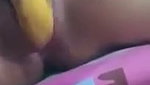 Sexy girl showing her pink pussy  rubing with banana