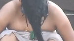 Aunty show her boob while changing outdoor