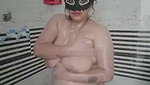 Beautiful hot mature aunty showing  taking bath