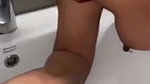 Beautiful housewife wash her face  show nipple