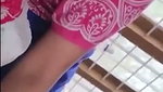 Beautiful housewife showing her boob