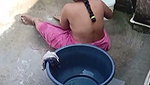 Mature aunty showing  washing cloth