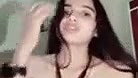 Beautiful girl showing her boob