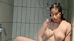 Beautiful girl fingering her pussy  taking shower