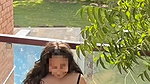 Beautiful girl fingering her pussy on balcony