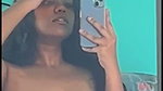 Beautiful girl showing her boob