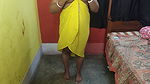 Sexy Bengali Bhabi fucking with Cucumber in her bedroom in yellow dress