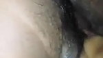 Rubbing her wet pussy