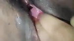 Rubbing her wet pussy