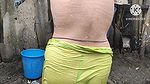 Indian house wife bathing