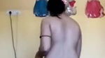Cute Girl recording herself while dress changing