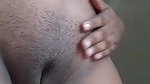 Pissing and showing her shaved pussy