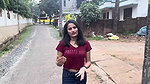 desi girl walking in red tshirt showing navel 22