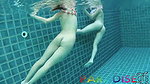 Underwater public pool threesome with two cock hungry sluts