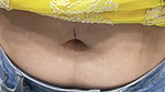 sexy nerd girl hot navel piercing in yellow top1