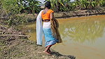 Amazing Village Women Net Fishing in Muddy Water
