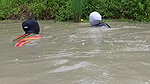 Amazing Masked Village Women fishing in the Rain