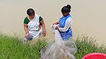 Amazing Two Village Women Catching Fish with Net