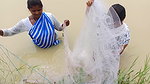 Amazing Two Village Women Catching Fish with Net