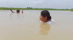 Amazing Two Village Women Catching Fish with Net