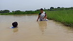 Amazing Two Village Women Catching Fish with Net