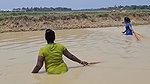 Amazing Village Women Net Fishing in Muddy Water