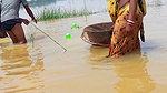 Indian Woman Goes Fishing in Flood