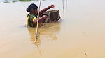 Indian Woman Goes Fishing in Flood