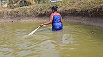 Mouni Fishing in Village pond floating on a Thermo