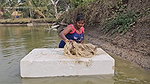 Mouni Fishing in Village pond floating on a Thermo