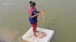 Mouni Fishing in Village pond floating on a Thermo