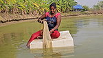 Mouni Fishing in Village pond floating on a Thermo