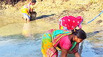 Traditional Hand Fishing by Village Women    Villa